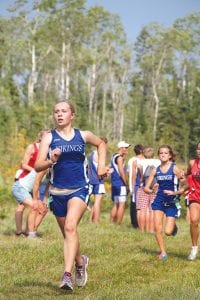 The Cook County boys' and girls' cross country team held its first (and only) meet on Thursday, September 1 on Pincushion Mountain Trails. Far left: Running strong for the boys was Nate Carlson and Will Seaton, who finished less than a second back of Carlson. Above: Sara Schield leads teammate Matea Acero to the finish line, finishing 2 seconds ahead of Matea. Mara MacDonell was the fifth girl in for the Vikings girl’s varsity team, placing 43rd overall.