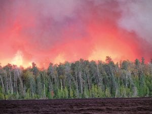 A view of the Pagami Creek fire from Polly Lake, looking west. Polly Lake is about 12 miles from Sawbill Outfitters in Tofte. Bill Hansen, co-owner of Sawbill Outfitters, was at his business when the Pagami Creek fire made its 16-mile “run” on Monday, Sept. 12. Hansen said the fire was about seven miles from his business at its closest point. It is hoped that recent rains will stop the fire from spreading.