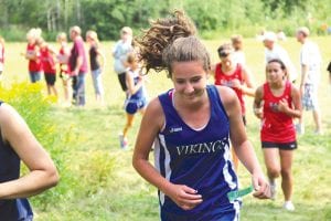 Audrey Summers led the Vikings with a 24th place finish at the crosscountry meet in Eveleth. Audrey was 90 seconds faster this year than last year, a big improvement.