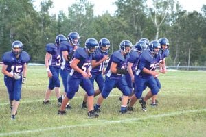 The Viking football team has shown steady improvement since their open season loss to Esko. Against the Mesabi East Giants the entire team played well, both on offense and defense. Here the boys are lining up against Barnum, another conference foe they beat. The Vikes are 2-0 in conference play. There is no game next Friday because Carlton has cancelled its season.