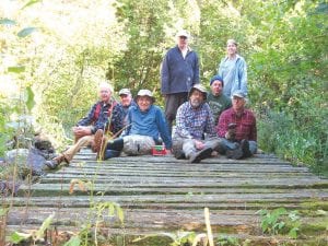 Members of the Banadad Trail Association and the North Star Ski Tour Club spent a weekend rebuilding a bridge on the Banadad ski trail in the Boundary Waters Canoe Area Wilderness recently. The hardworking crew was (L-R, front) Pete Harris, Len Voit, Lee Wenzel, Tom Rice, Steve Lenius, and Lowell Johnson. (L-R, back) Ted Young and Karla Miller.