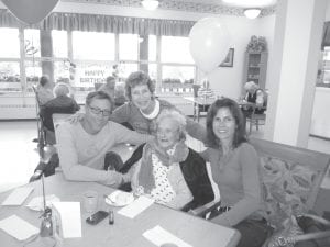 There were two milestone birthdays celebrated at the North Shore Care Center in September – just in time for National Centenarian Day on Sept. 22. Celebrating birthdays were Irene Leng and Mable Stoltz who have been friends since school days in Grand Marais. Above left: Mable Stoltz enjoyed her 100th birthday on September 20 with several parties with family and friends. Above right: Irene Leng celebrated her 100th birthday with her family and friends on September 16. Irene is pictured here with her daughter Beth Schroeder (behind), her granddaughter, Heidi (Schroeder) Kealey, and her granddaughter's husband, Tom Zingaro.