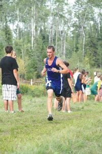 Sophomore Drew Christiansen runs a very fast 100-meter dash in track, but in the fall he shows his versatility by running 3.1 (5k) miles at a very good pace. Drew ran 22:03 at Milaca.