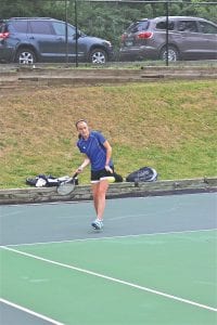 Junior captain Cecilia Schnobrich leads the girls' tennis team this fall. Although young and inexperienced, the girls have been gaining great experience as they get better every week.