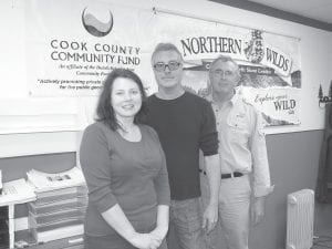 The Cook County Community Fund and Northern Wilds Publishing teamed up to create a directory of all the non-profit organizations and volunteer groups in Cook County. (L-R) Amber Pratt, Richard Olson and Shawn Perich worked on the directory, which is being mailed to every home in the county this week.