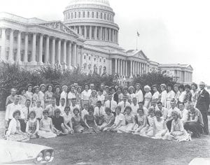 On June 21, 1961, the Cook County High School band marched down the Atlantic City Boardwalk, taking part in the International Lions Club convention parade. The Lions Club, band parents, community members and businesses helped raise $8,000 to fund the trip, which included a visit to Washington, D.C. Congressman John Blatnik (behind the students) presented Band Director Harold Ikola with a U.S. flag.