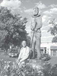 Pierre the Voyageur—at the intersection of Wisconsin Street and Highway 61 by Java Moose in Grand Marais—got a makeover this summer. Pierre had become quite weathered over the years, and Carl Foster of Carl’s Painting Service volunteered to clean the dirt out of his crevices and re-stain him. Pierre has become a little difficult to see with the City of Grand Marais sign and mountain ash trees in front of and beside him. He’s been there since about 1972. Foster, a Cook County history enthusiast—has his eye on painting the Grand Marais icons at the bottom of Second Avenue West—near the Grand Marais Public Library—next. The bear in a boat and the voyageur carrying a canoe once welcomed visitors to the Gunflint Trail via a rather confusing, circuitous route.