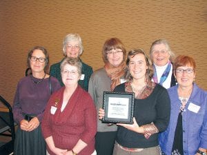 A contingent of Cook County community organizers attended the 2011 Touchstone Awards in Duluth this month, accepting an award for Empty Bowls, an event bringing the Grand Marais Art Colony, Cook County Food Shelf and the entire community together. At the Touchstone event were (L-R, front) Sharon Frykman, Gwen Lenz, , Amy Demmer, Beth Kennedy. (L-R, back) Mary MacDonald, Jan Morris, Joan Farnam. (Not pictured-Kristine Bottort)