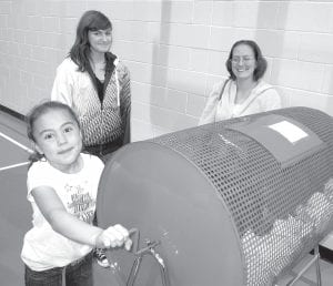 On Thursday, October 6, there was an Indian Taco Fundraiser at the Grand Portage Community Center to help some of the county’s Girl Scouts who are planning a trip to Savannah, Georgia for the 100th anniversary of Scouting. Pictured here are Shaelynn Novitsky, Brooke Sherer and parent volunteer Kayla Gotchie getting ready to draw the winning ticket for the 50-50 raffle also held that night. Over 20 family and community volunteers helped Girl Scouts Brooke, Emma, Haley, Linnea and Shaelynn sell almost 200 Indian tacos. The scouts and their families express heartfelt thanks to the Grand Portage community for their enthusiastic support of this worthwhile cause. The lucky winner of the 50/50 raffle was Sharon Walker who won $207 cash. For more information about the Girl Scout trip or to make a donation toward expenses, contact Laura at (218) 475-2390 or Arvis at (218) 387-2487.