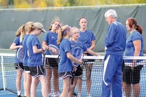 Top: Head Coach John Muus fired up to his players at a recently held match against Denfeld. The Vikings’ team is mostly young, but they gained a ton of experience this year. Cecelia Schnobrich, left, and Brenna Hay in action against Duluth Denfeld. Schnobrich won in three sets.