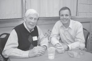 Above left: George Nelson of Lutsen, the founder of Lutsen Mountains ski area and a longtime advocate for tourism on the North Shore, enjoyed visiting with MN Representative Tony Sertich. Sertich is a commissioner on the Iron Range Resources and Rehabilitation Board, which has provided assistance to the North Shore’s tourism industry. Above: Cook County Visitors Bureau Board Member Charles Skinner and Cook County Visitors Bureau Executive Director Sally Nankivell check out the beautiful gift table display. Far left: Robby Vee and his rock ‘n roll caravan performed classic pop, swing, rockabilly and bop music at the event at the Grand Portage Lodge and Casino. Left: Attendees enjoyed the fabulous buffet put on by the Grand Portage Lodge and Casino.