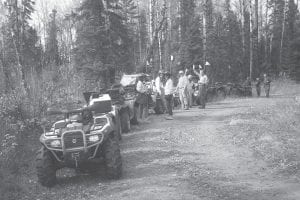 Members of the Cook County ATV Club enjoyed a perfect fall day, riding forest roads in the Tofte area during the club’s West End Ride on Saturday, Oct. 8. Top: Along the way were many stops to stretch and socialize.