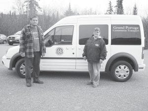 Grand Portage Elders are delighted with their new Ford transport van, thanks to the Grand Portage Tribal Council. The van will be used for the Elder Nutrition Meals-On-Wheels program and to get Elders to the store, post office and on other errands. Pictured with the new Grand Portage bus are bus driver Ben LeSage and volunteer Diane Bennett.