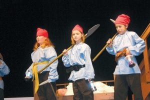 These three dwarfs are poised to protect Snow White in the Grand Marais Playhouse production of The Rockin’ Tale of Snow White opening Saturday, November 5, 2011. The play promises plenty of song and silliness. (L-R) Chloe Blackburn, Andrea Larsen, and Dominic Wilson.