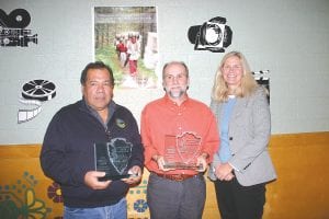 Below: Before the film, there were brief speeches and acknowledgements of the many people who helped make the film a reality. National Park Service Midwest Region Deputy Director Patricia Trap (right) presented partnership awards to Grand Portage Tribal Chair Norman Deschampe and Grand Portage National Monument Superintendent Dr. Timothy Cochrane.