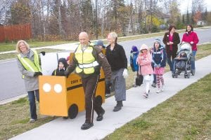 International “Walk to School Day” was Wednesday, October 26 and dozens of children and community members caught a “Walking School Bus” to Cook County Middle/High School, Sawtooth Elementary and Great Expectations School. Cook County Public Health & Human Services Director Sue Futterer and Sheriff Mark Falk lead the Walking School bus up 1st Avenue.