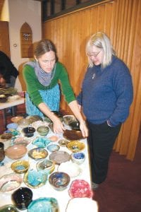 Left: The First Congregational Church in Grand Marais was a busy place on November 10 during Empty Bowls. Upstairs were the amazing bowls made by community members to be filled with delicious donated soup.