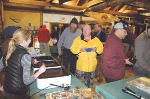 There was a full house for the Deep Freeze Chili Feed on Saturday, November 19, including Buddy Skinner of Grand Marais (center, in yellow jacket).