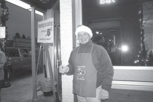 Ringing the bell at the Salvation Army Red Kettle before and after the Grand Marais Chamber of Commerce Christmas parade on Friday, November 25 was Dick Parker of Grand Marais. A cheerful presence like Dick helps bring more money to the Salvation Army coffers, which in turn helps community members throughout the year.