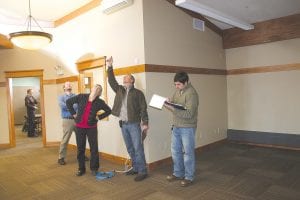 On Tuesday, November 29, the newly expanded Grand Marais Public Library got a thorough inspection. City Administrator Mike Roth and Library Director Linda Chappell talk about the library lighting system with Tom Wacholz and Rob Barse of ORB Management. ORB Management served as the construction managers for the library project.