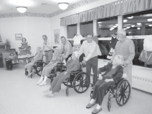 With a Dosado and Allemande Left! The Cook County Arrowtippers performed at North Shore Care Center on Thanksgiving weekend for the 4th annual square dance. The residents and partners lined up for instructions about the Virginia Reel dance.