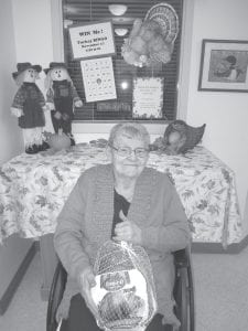 Jane Backstrom was the proud winner of a 12-pound turkey at the Turkey Bingo game at North Shore Care Center just before Thanksgiving. She donated the turkey to the First Congregational Church for the annual Community Thanksgiving dinner.