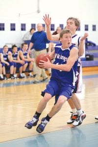 With his defender left in the dust, Dylan Quaife takes the ball hard to the hole against Nashwauk-Keewatin. Quaife scored points in the contest and played great defense. The Vikings won their first game of the year by 10 points over a stubborn Nashwauk team.