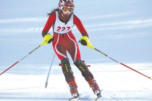 Ava McMillan flashes the form that took her to a 13th place finish at the recently held Alpine ski meet held at Lutsen Mountains. Just a 9th grader, Ava was the second skier for the varsity team.