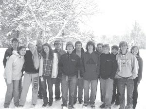 The Nordic Vikings found snow to practice on in Ironwood, Michigan at the beginning of December. (L-R, front) Sarah Larsen, Cailan Carpenter, Audrey Summers, Will Seaton, Joey Chmelik, Jaret Baker, Ben Seaton. (L-R, back) Nate Carlson, Mark Summers, Dylan Deschampe, Levi Axtell, Kelly Summers, Mara MacDonell, Abbey Sutton.