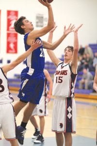 Senior guard David Bergstrom has helped lead his team to a 3-0 start. Bergstrom was second team all conference last year and should make the first team if he continues his fine all-around play. Here he goes up for two points against Nashwauk-Keewatin.