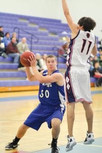 Junior guard Colin Everson is as dependable as the Maytag repairman. Game in and game out Everson gives the team solid, high-energy play on both ends of the court. He scores on the inside or from the outside, rebounds, makes smart passes, plays tough-as-nails defense and is one of the leaders on the 4-1 team.