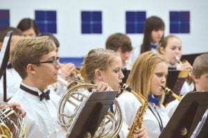 The Cook County High School band warmed its audience with a rousing holiday concert on December 20. Community members filled the bleachers for one of the biggest local events of the Christmas season. (L-R) Ben Seaton, Bekah Lakey, and Sarah Fagerman.