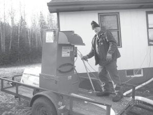 Thanks to a grant from the Lloyd K. Johnson Foundation, some Grand Portage residents are a bit warmer this winter. In November, the Grand Portage Housing Authority (GPHA) purchased a Krendl 475 insulation-blowing machine. Six homes have been completed by GPHA Maintenance Engineer Bill Dahl to date.