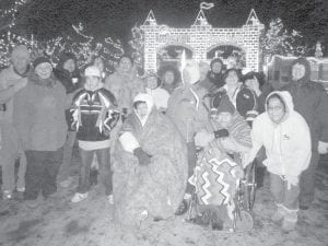 It was a busy month of holiday fun for the Grand Portage Elders program. Freezing but having fun at the Bentleyville holiday light show were Elder program participants and their young friends. The group also 