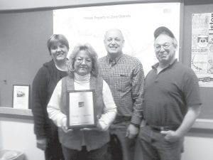 Cook County recently received an award from Minnesota Counties Insurance Trust, its insurance provider, for being “overall most improved” in its Property, Casualty, and Worker’s Comp Division. Personnel Director Janet Simonen attributed the accolade to good claims management in Auditor-Treasurer Braidy Powers’ office, good building and grounds maintenance by Brian Silence and his staff, and initiatives of the county’s safety committee. Displaying the award (L-R) are county commissioners Sue Hakes, Jan Hall, Bruce Martinson, and Fritz Sobanja. Not pictured is Commissioner Jim Johnson.