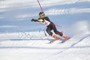 Will Lamb bends the gate in half as he makes his slalom run down the hill. Lamb was the Vikings' second-placing skier at the Hibbing Invitational where the team placed second in an eight-team meet.