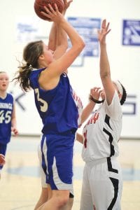 When the Vikings badly need a basket Theresa Morrin (above) has often been able to drive to the hoop and score. Here she goes up for 2 points against Cherry. Leah Utities (upper right) goes for a lay-up against Silver Bay and Kaitlyn Linnell (right), a great rebounder and defender, hits for 2 points.