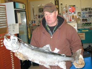 Ron Schlienz of Grand Marais stopped by to show off his frosty catch on Monday, January 16. The big lake trout was 19¾ pounds. Schlienz said he caught it on Gunflint Lake but didn't want to share any other information. Asked what depth the big trout was caught in, Ron said simply, 