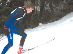 Nate Carlson displays the strong uphill technique that helped carry him to an excellent 20th place finish in the JV race at Spirit Mountain.