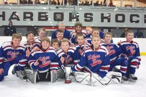 The Silver Bay/Cook County Squirts had a fabulous weekend at the recent Two Harbors tournament, with two overtime wins and a shoot-out victory. (L-R, front) Ethan Sporn, Thomas Rowlee, Cameron Roy, Peyton Westerlund, Andrew Miller, Ryder McMillen, Connor Sullivan, Sully Tikkanen, Timmy Perfetto. (L-R, second row) Austin Johansen, Ero Wallin, Nic Reineccius (L-R, back) Connor Somnis, Josh Prom, Gavin LeBlanc.