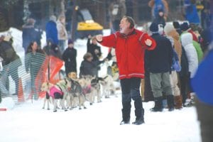 Jack Stone of Stone Harbor Wilderness Supply kept a watchful eye on the excited sled dogs behind him as he counted down the start for each team.