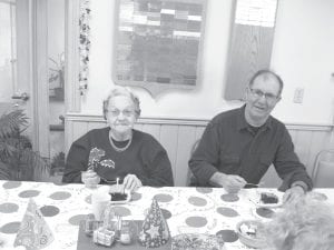 A birthday celebration was held at the Cook County Senior Center last month for Iola Wojtysiak. She turned 91 on January 20. She is pictured at her birthday party with her son-inlaw Orvis Lunke.