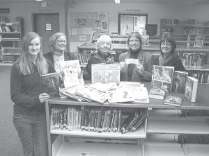 A happy group of book lovers gathered at the Cook County School District recently to say thanks to the Library Friends of Cook County for a generous donation to the school libraries. Principal Gwen Carman was pleased to accept a check for $4,500 for the libraries. She said the annual donation is a tremendous contribution that greatly enhances the district's ability to purchase new books, media, magazine subscriptions and also supports our Middle School Page Turners student group. (L-R) Eighth-grader and Page Turner representative Emma Kroska, Media Center Director Shelby Anderson, Library Friends Board Member Jean Bushman, PK-12 Principal Gwen Carman and Library Friends Treasurer Clara Weitz.