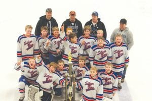 The Cook County/Silver Bay Squirts are pictured here with the 4-foot high, 1st place trophy they claimed at the Skate on the Edge Tournament in Duluth January 27 - 29. (L-R, kneeling) Andrew Miller, Cameron Roy, Ryder McMillen, Sully Tikkanen, Connor Sullivan, Timmy Perfetto. (L-R, standing) Austin Johansen, Ero Wallin, Ethan Sporn, Gavin LeBlanc, Peyton Westerlund, Josh Prom, Connor Somnis and Thomas Rowlee, Nic Reineccius. Coaches: Jody Reineccius, Jim Roy, Mike Rowlee and Dusty McMillen