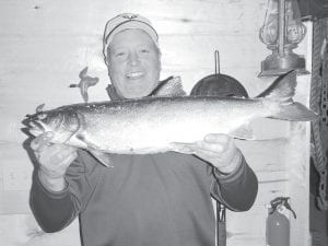 Whenever Jim Hermes goes fishing the lake level drops just a little bit because of all of the fish he catches. Here is a nice 7-pound lake trout he pulled from West Bearskin earlier this winter. If your canoe hits bottom next summer where it never used to on West Bearskin, blame Jim.