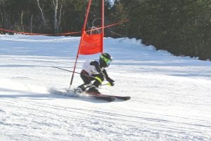 Race No. 4 of the Northland Junior Race Series was held at Spirit Mountain on January 22. At day’s end the Lutsen skiers achieved seven podiums and a handful of top fives. Above: Eight-year-old Riley Tarver charges to a first place finish.