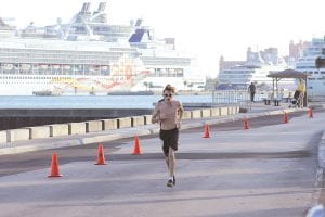 Nate Carlson recently traded his cross country skis and ski suit for running shorts, shoes, and sunglasses when he traveled with his family to the Bahamas to run in a half-marathon (13.1 miles). The race was held in Nassau. His mom, Julie Carlson, won the trip and the entry into the race. Nate, a 9th grader at CCHS, finished sixth in his age group.