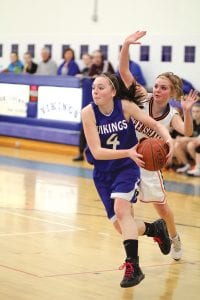 Junior guard Leah Utities blew by the Wrenshall guard on this play and scored on a lay-up. Utities has been coming on strong late in the season for the Vikings.