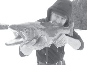 Henry Walch of Lutsen and his friend Ian Gallagher were fishing on Trout Lake on Valentine’s Day when Henry almost lost this nice-looking rainbow trout. Henry had an “epic” struggle landing the fish through his six-inch ice hole. Ian (heroically) stepped in with the gaff to get it through the ice. The rainbow was 6 pounds 2 ounces and 24 inches long.