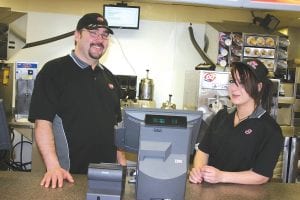 Rob Hackett and new employee Kayla Stacy are all smiles and ready to make you food or ice cream at the newly re-opened, re-furbished Dairy Queen in downtown Grand Marais. After all of the employees have been hired and trained a grand opening will be held in April.